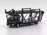 Black diecast metal transport truck with flatbed and rail cage