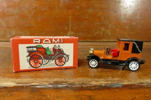 Vintage RAMI diecast landaulet car with original box, orange and black detail