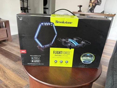 Brookstone Flightforce racing drone retail box with octagonal LED ring graphic