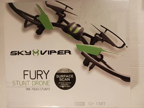 Sky Viper Fury stunt drone in box, black and green quadcopter with propellers