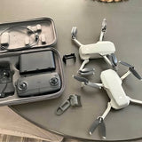 DJI Mavic Mini drone with remote controller, spare battery, and propeller guards