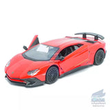 Red diecast sports car model with black wheels, front 3/4 view