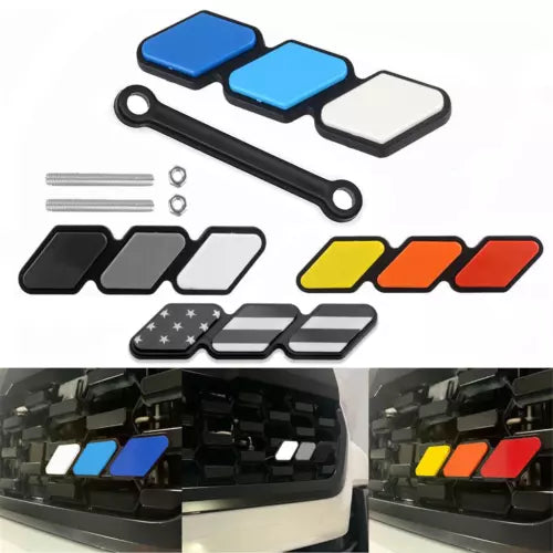 Diecast car model parts set with colored panels, strips, and small hardware pieces