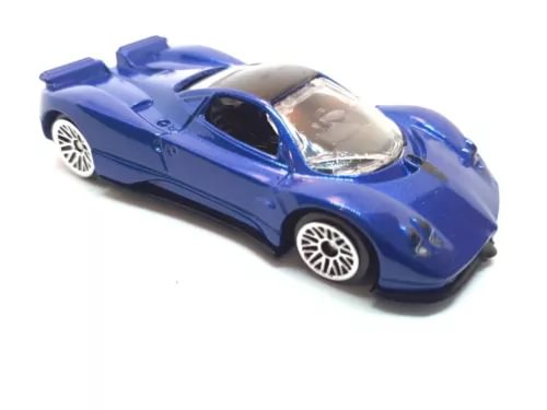 Blue diecast sports car model with detailed hood and black wheels