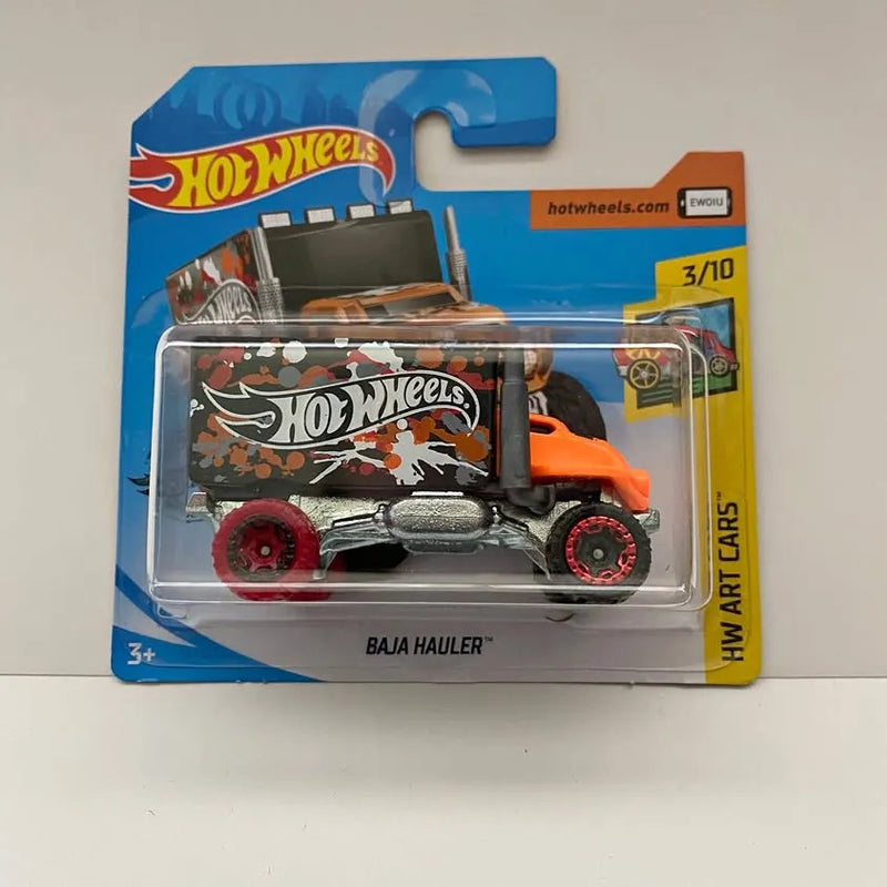 Hot Wheels Baja Hauler diecast truck on card, orange body with red wheels