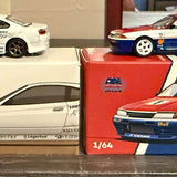 Diecast model car in box, red and blue 1/64 scale, front corner view