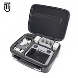 Hard shell drone EVA case with molded foam inserts and zip lid, holding controller and spare parts