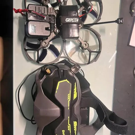 GEPRC Cinelog 35 FPV drone with four propellers and camera mount, black frame