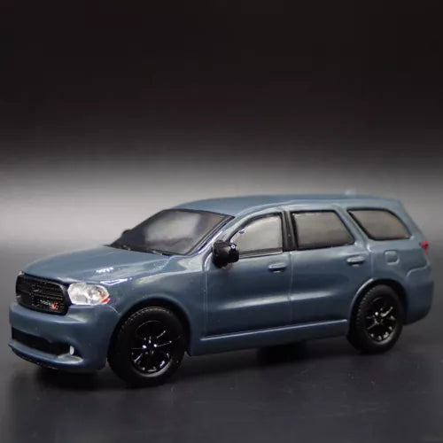 Light blue 1:64 diecast SUV model with detailed grille and headlights