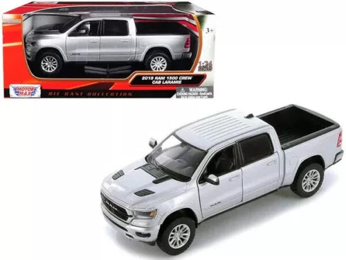 White diecast pickup truck model, front three-quarter view, crew cab