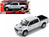 White diecast pickup truck model, front three-quarter view, crew cab
