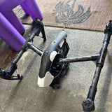 DJI Inspire One quadcopter drone with propeller arms and mounted gimbal