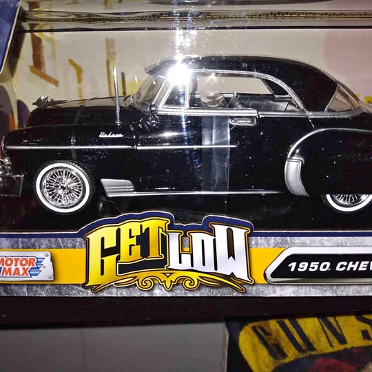 1950 Chevy Deluxe 1/24 scale diecast lowrider, black with chrome wheels and front grille