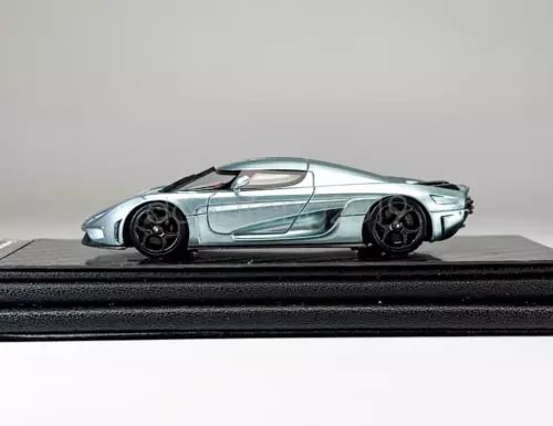 Ice blue sports diecast resin model car with black wheels, side view