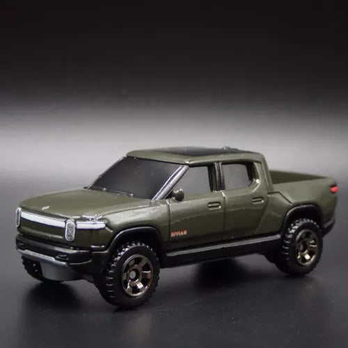 Olive green diecast pickup truck model, front three-quarter view, black wheels