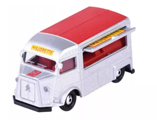 White diecast model van with red roof, front doors and side window detail