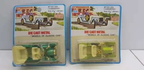 Diecast classic car model set in blue blister packaging, multiple vehicles and parts inside