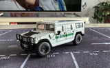 Diecast off-road SUV toy, white with green side stripe and black grille, detailed wheels