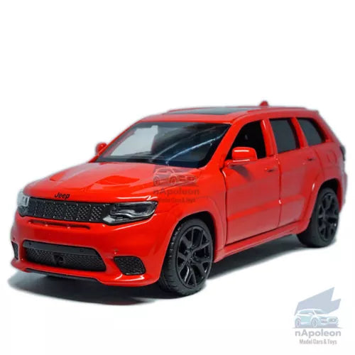 Red Jeep SUV diecast model car with black wheels, front three-quarter view