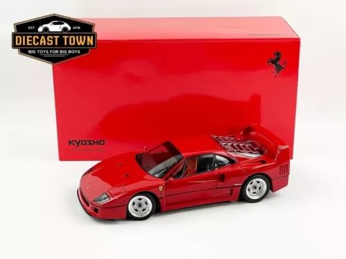 Red Ferrari F40 diecast model car with opening parts, front three-quarter view