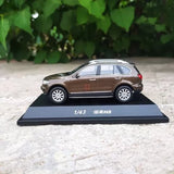 1/43 diecast SUV model, brown H8, side view with roof rails