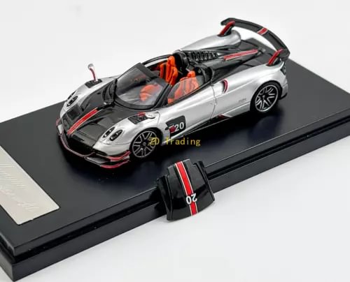 1:64 silver sports diecast car with black and red accents, number 20, on display base