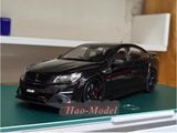1:18 black diecast model car with red brake calipers, front 3/4 view