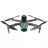 Gray quadcopter drone with front camera and four black propellers, green LED accents