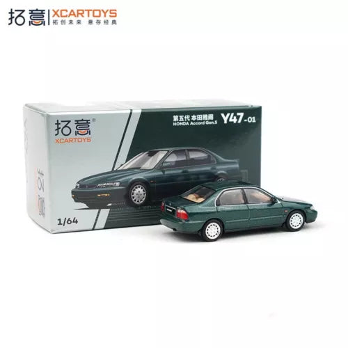 1:64 scale diecast sedan model car, green with black stripes, in display box
