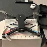 Foldable quadcopter drone with central camera mount and four propellers