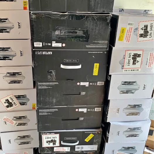 Stack of boxed drone/quadcopter units for wholesale, multiple cartons