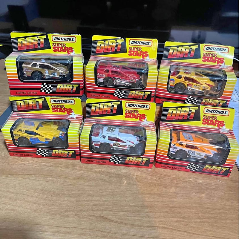 Set of 6 boxed Matchbox Dirt Super Stars diecast cars, multicolor