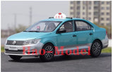 Turquoise diecast Volkswagen Santana taxi model car, front three-quarter view, detailed wheels