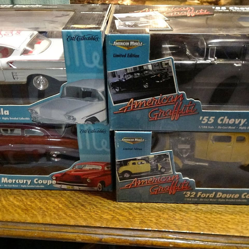 American Graffiti diecast car set in boxes, featuring 55 Chevy and 32 Ford.