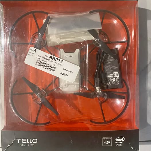 DJI Tello mini quadcopter drone with four propellers, shown in retail packaging