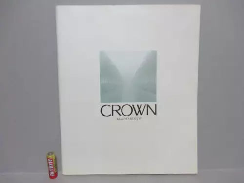 Diecast car toy display box with CROWN logo, white package.