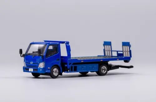 Blue 1:64 diecast flatbed tow truck model with raised towing equipment