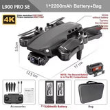 Gray mini quadcopter drone with camera, four propellers, compact body