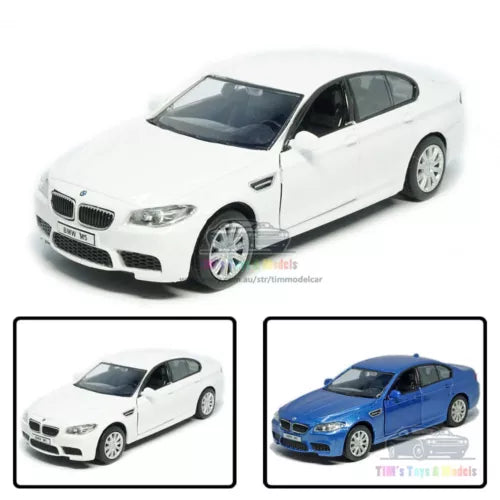 White BMW M5 alloy diecast model car, front three-quarter view, detailed wheels