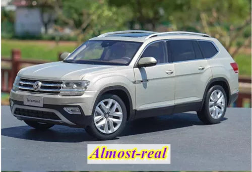 Diecast model SUV car in gray with detailed headlights and wheels