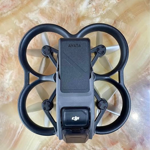 DJI Avata drone with central controller and four propeller arms