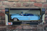 1:24 scale diecast 1958 Chevy Impala convertible model in blue, in display box