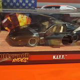 K.I.T.T. diecast car, black with circular headlights and gold accents in display box