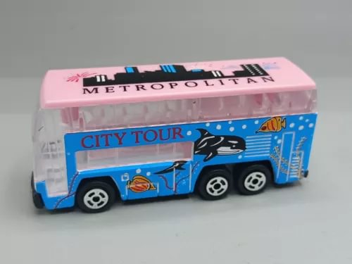 Diecast city tour bus toy in blue with whale-themed graphics