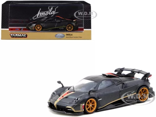 Matt black carbon fiber diecast race car with gold wheels, front 3/4 view