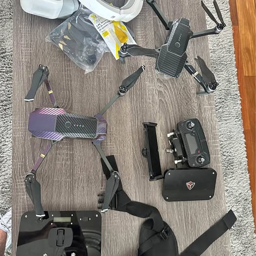 DJI drone accessories set with folded quadcopter and remote controller