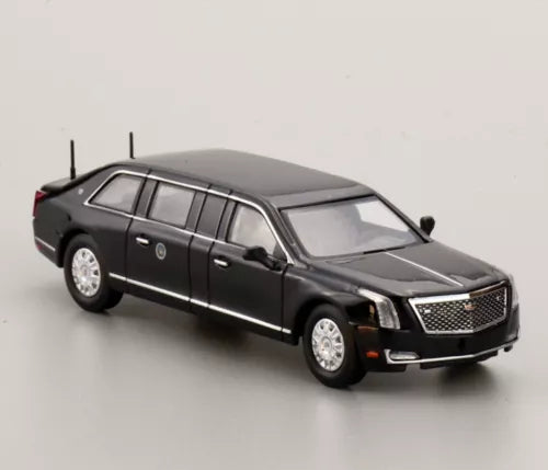 Black diecast metal limo model car with chrome grille and headlights, four-door