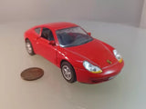 Red Porsche 911 Carrera diecast toy car, front view