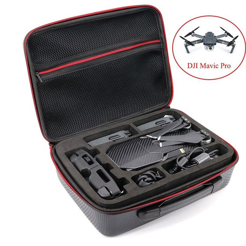 Waterproof hard shell drone storage bag with foam compartments, open with drone parts inside.