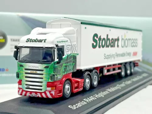 Diecast lorry with green cab, red grille, and white biomass trailer